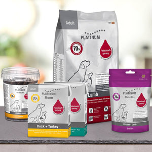 PLATINUM Poskusni paket Large, najboljša izbira za pse srednjih in večjih pasem: raznolika embalaža s silhuetami psov ter okusi jagnjetine in piščanca.